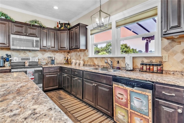 201 Millstream Ln, Zelienople Boro, PA 16063 - kitchen with appliances with stainless steel finishes, a chandelier, dark brown cabinetry, dark wood-style flooring, and crown molding