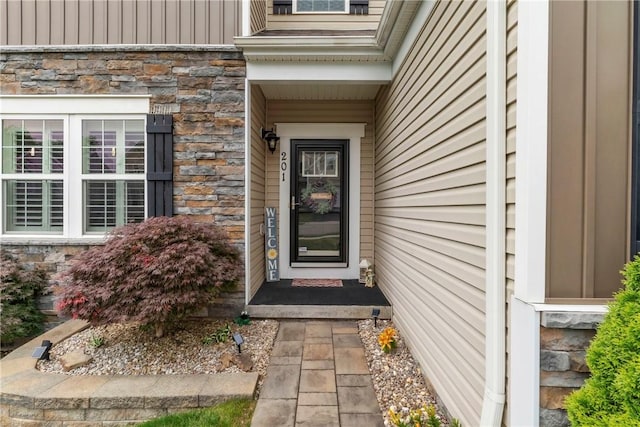 201 Millstream Ln, Zelienople Boro, PA 16063 - property entrance with stone siding and board and batten siding