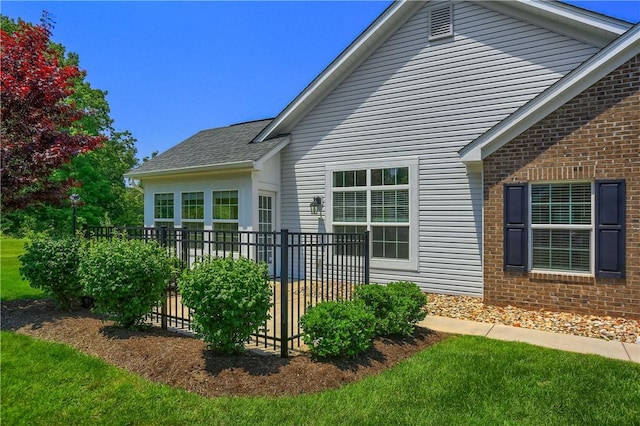 705 Spring Valley Dr, Jackson Twp, PA 16063 - back of house with brick siding and roof with shingles
