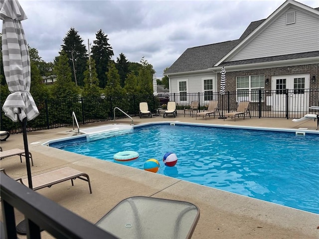 705 Spring Valley Dr, Jackson Twp, PA 16063 - view of swimming pool featuring a patio and french doors