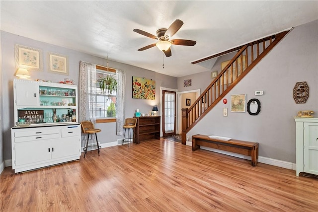 323 Fairmont St, Latrobe, PA 15650 - entryway featuring stairway, ceiling fan, and light wood finished floors