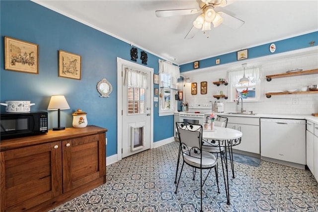 323 Fairmont St, Latrobe, PA 15650 - dining room featuring a ceiling fan and ornamental molding