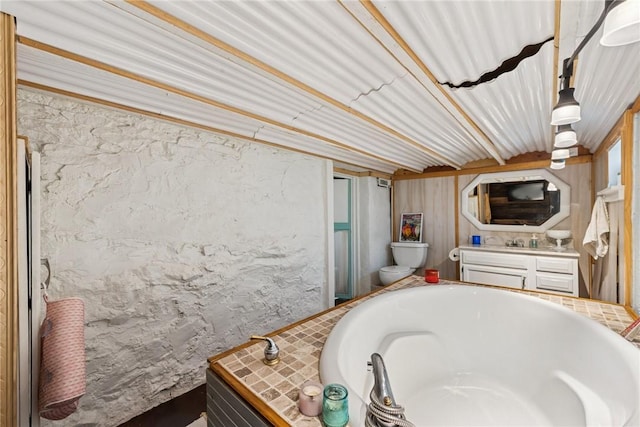 323 Fairmont St, Latrobe, PA 15650 - bathroom with a tub to relax in and vanity