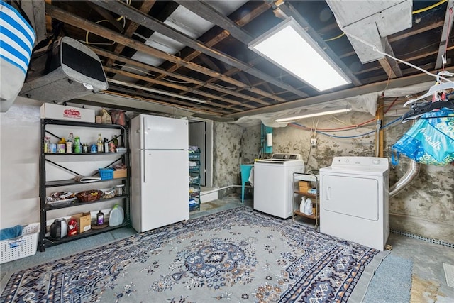 323 Fairmont St, Latrobe, PA 15650 - unfinished below grade area featuring freestanding refrigerator and washer and clothes dryer