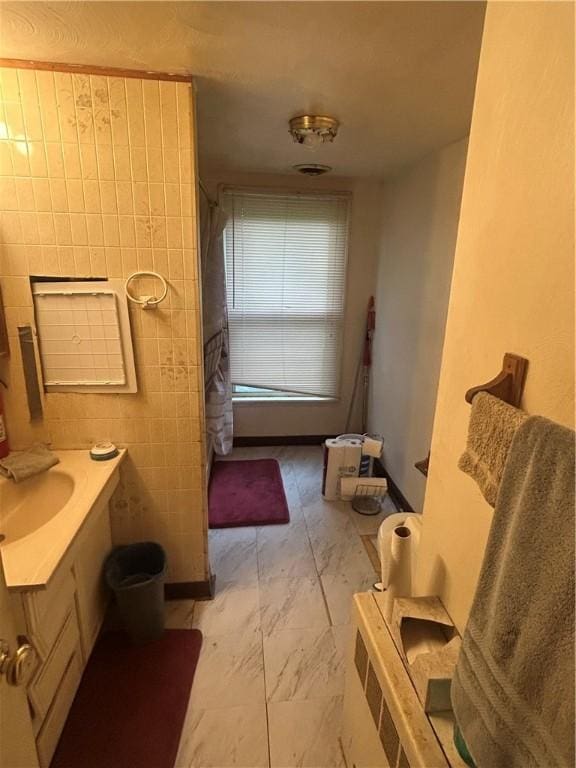 108 Leneake St, Wilkins Twp, PA 15145 - bathroom featuring marble look tiles, vanity, and a shower with shower curtain