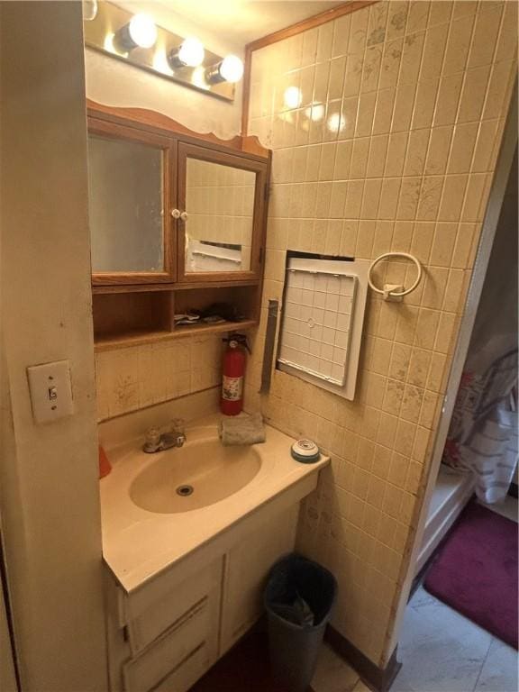 108 Leneake St, Wilkins Twp, PA 15145 - full bath with a shower with shower curtain, vanity, and tile walls