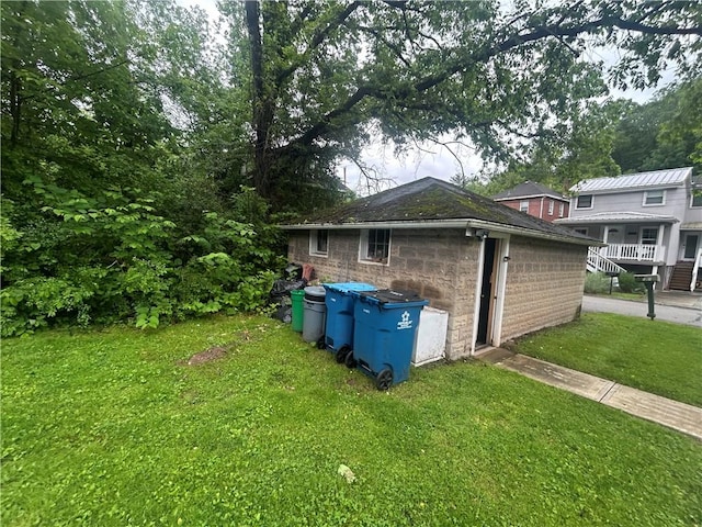 108 Leneake St, Wilkins Twp, PA 15145 - view of home's exterior featuring a lawn and an outbuilding