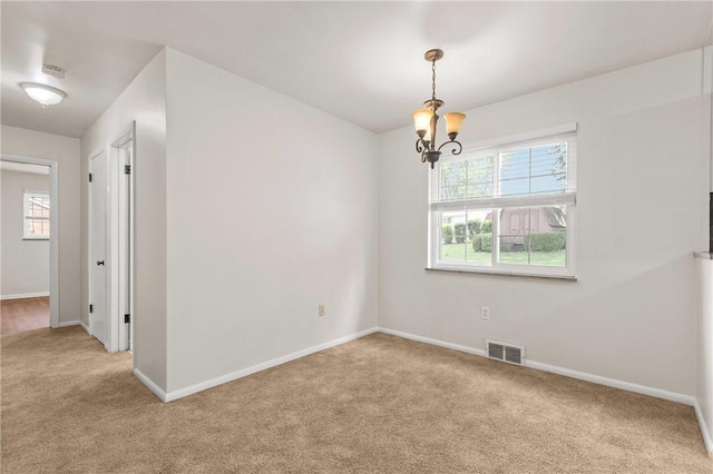 5311 Clearview Ave, Hopewell Twp Bea, PA 15001 - unfurnished room featuring carpet, healthy amount of natural light, and a chandelier