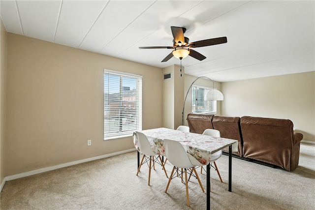 5 Bayard Rd Unit 113, Shadyside, PA 15213 - dining room featuring light carpet, plenty of natural light, and a ceiling fan