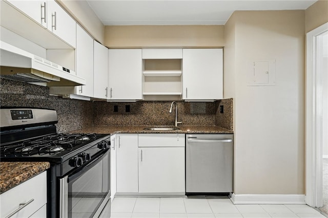 5 Bayard Rd Unit 113, Shadyside, PA 15213 - kitchen featuring appliances with stainless steel finishes, open shelves, backsplash, white cabinets, and dark stone countertops