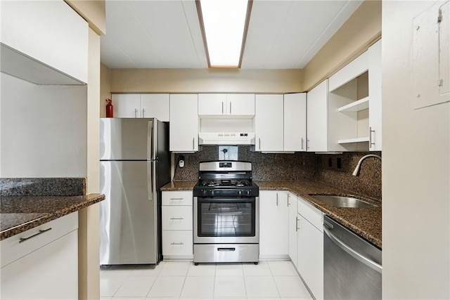 5 Bayard Rd Unit 113, Shadyside, PA 15213 - kitchen with appliances with stainless steel finishes, range hood, open shelves, white cabinetry, and backsplash