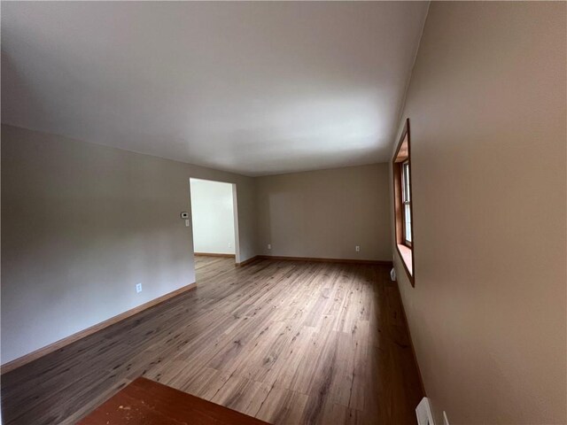 742 King St, Mckeesport, PA 15132 - empty room featuring wood finished floors and baseboards