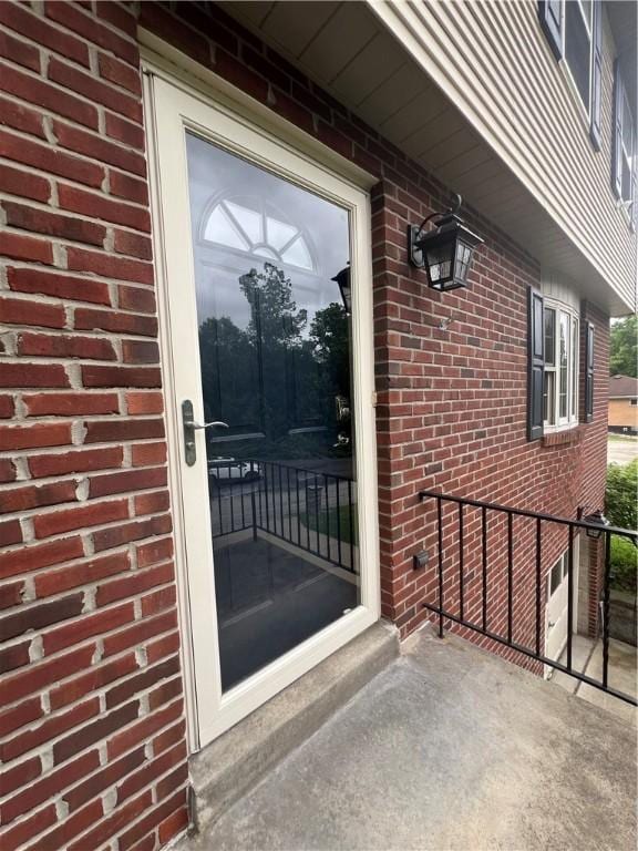 742 King St, Mckeesport, PA 15132 - property entrance featuring brick siding