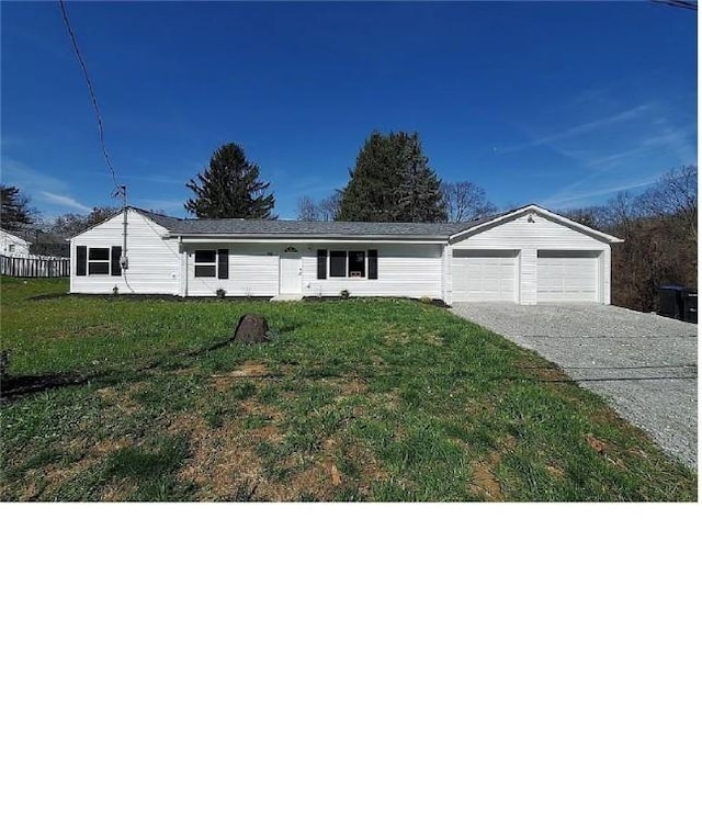 105 Becks Run Rd, Moon/Crescent Twp, PA 15108 - single story home with concrete driveway, an attached garage, and a front lawn