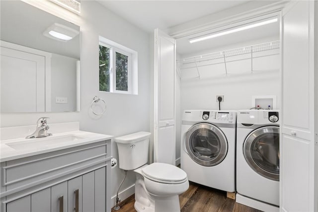 105 Becks Run Rd, Moon/Crescent Twp, PA 15108 - washroom with washer and dryer and dark wood-style flooring