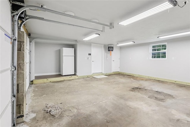 105 Becks Run Rd, Moon/Crescent Twp, PA 15108 - garage featuring freestanding refrigerator and baseboards