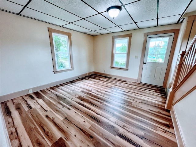 64 Beech St, Center Twp/Homer Cty, PA 15748 - entrance foyer featuring wood finished floors, healthy amount of natural light, a drop ceiling, and stairway