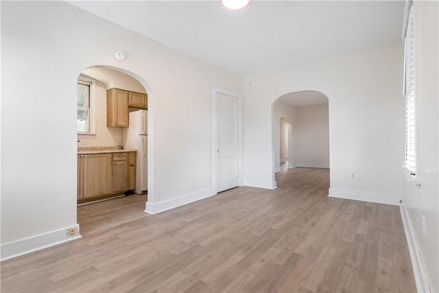 3937 Davis Ave, Munhall, PA 15120 - unfurnished room featuring light wood-style flooring and arched walkways