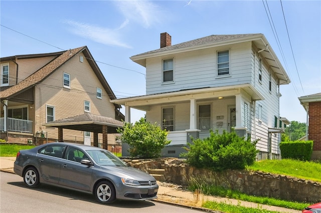 3937 Davis Ave, Munhall, PA 15120 - traditional style home with a chimney and a porch