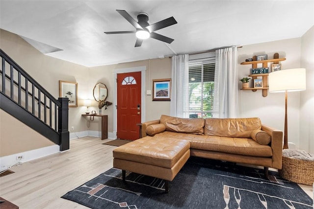 430 Lamar Ave, Regent Square, PA 15221 - living room with wood finished floors, ceiling fan, and stairway