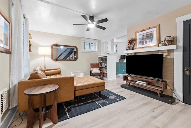 430 Lamar Ave, Regent Square, PA 15221 - living area with wood finished floors, ceiling fan, and a fireplace