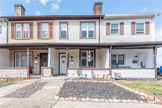 617 E 19th Ave, Munhall, PA 15120 - multi unit property with a chimney and a porch