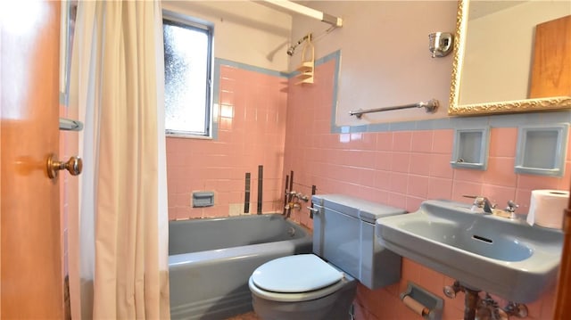 3550 Camp St, Hill District, PA 15219 - bathroom with shower / bath combo and tile walls