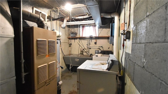 3550 Camp St, Hill District, PA 15219 - utility room with a sink and independent washer and dryer