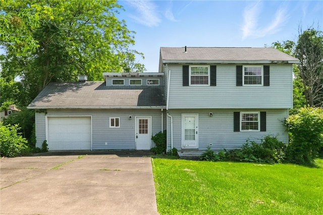 27 Windridge Dr, North Union Twp, PA 15401 - view of front of property with driveway, a front lawn, an attached garage, and roof with shingles