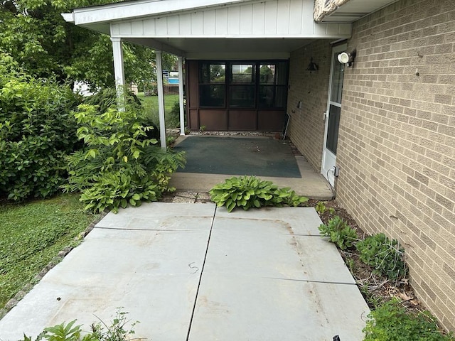 307 Debora Dr, Latrobe, PA 15650 - doorway to property featuring brick siding