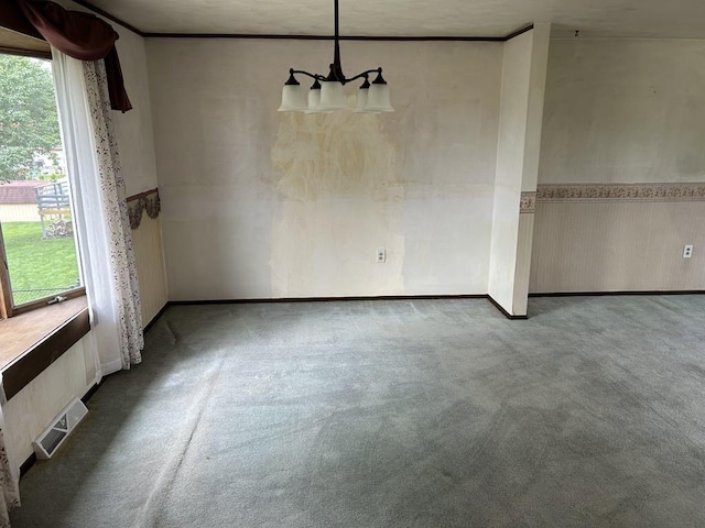 307 Debora Dr, Latrobe, PA 15650 - unfurnished dining area featuring carpet flooring and a chandelier