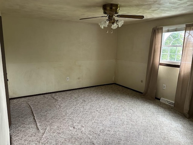 307 Debora Dr, Latrobe, PA 15650 - empty room with a ceiling fan and carpet floors