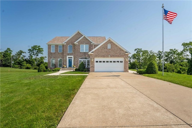 1002 Sunset Way, Menallen Twp, PA 15401 - view of front of home featuring a front yard, driveway, brick siding, and an attached garage