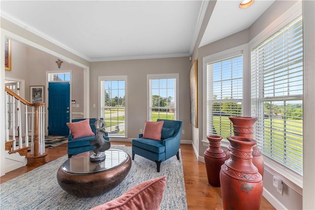 1002 Sunset Way, Menallen Twp, PA 15401 - sitting room with stairs, wood finished floors, and ornamental molding