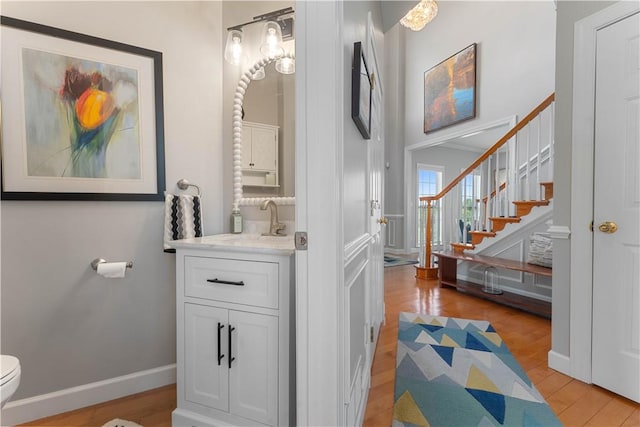1002 Sunset Way, Menallen Twp, PA 15401 - bathroom featuring wood finished floors and vanity