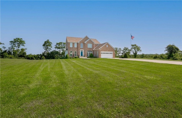 1002 Sunset Way, Menallen Twp, PA 15401 - colonial home featuring a front yard, an attached garage, and driveway