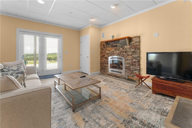 1002 Sunset Way, Menallen Twp, PA 15401 - living area with a stone fireplace and crown molding