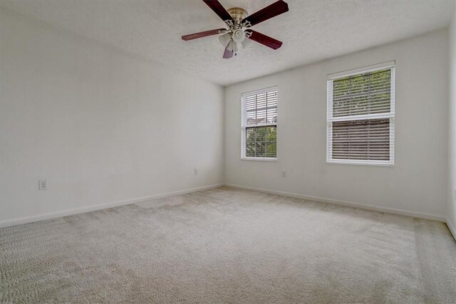 520 Panorama Dr, Cecil, PA 15317 - carpeted empty room with a textured ceiling and ceiling fan