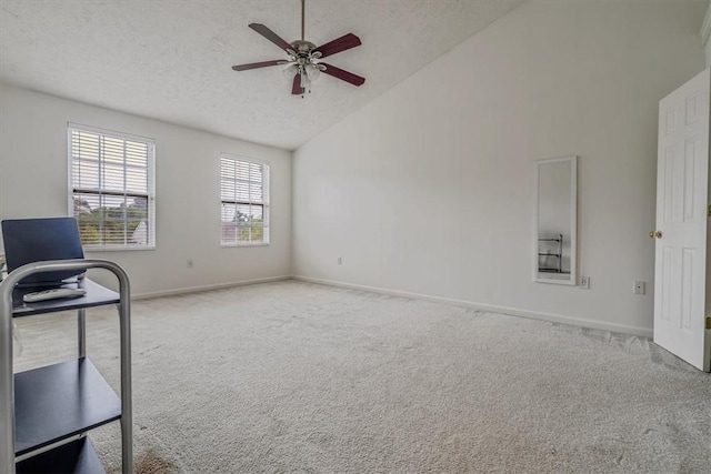 520 Panorama Dr, Cecil, PA 15317 - unfurnished living room featuring ceiling fan, carpet flooring, a textured ceiling, high vaulted ceiling, and a desk