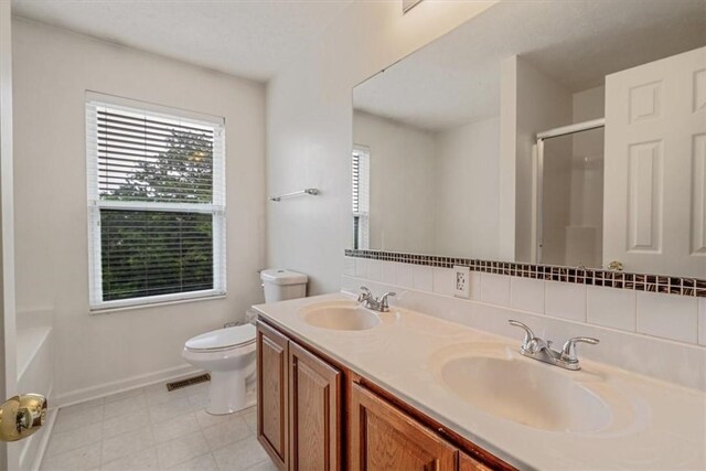 520 Panorama Dr, Cecil, PA 15317 - bathroom featuring a shower with door, plenty of natural light, and double vanity