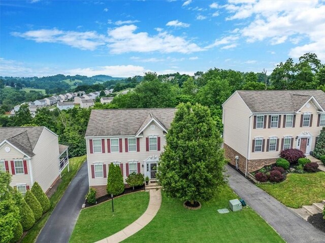 520 Panorama Dr, Cecil, PA 15317 - colonial-style house with asphalt driveway, a front lawn, and a residential view