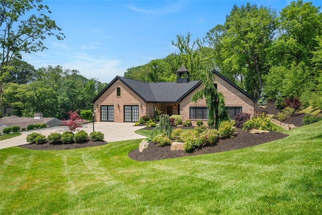 2356 Morrow Rd, Upper St Clair, PA 15241 - view of front of house with brick siding, a front lawn, and concrete driveway