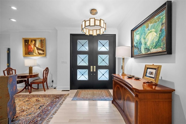2356 Morrow Rd, Upper St Clair, PA 15241 - foyer featuring wood finished floors, crown molding, french doors, recessed lighting, and a chandelier