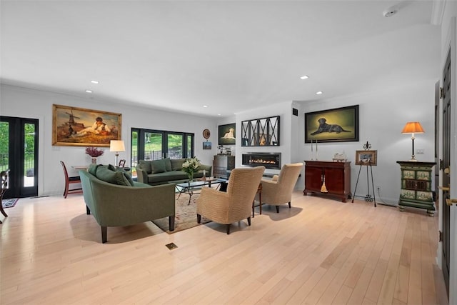 2356 Morrow Rd, Upper St Clair, PA 15241 - living area featuring a glass covered fireplace, recessed lighting, and light wood finished floors
