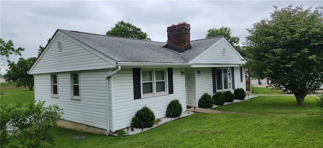 180 Pleasantview Dr, Ohioville, PA 15059 - view of front of house featuring a chimney, a front yard, and roof with shingles