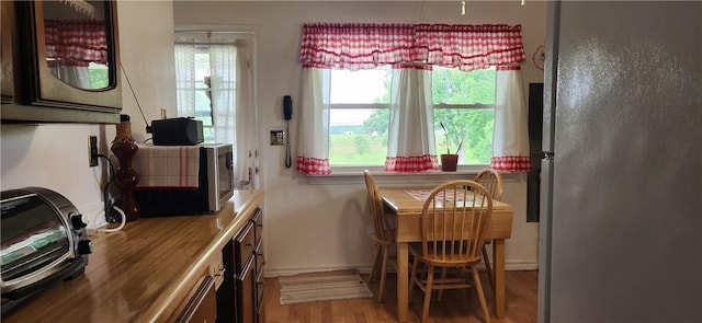 180 Pleasantview Dr, Ohioville, PA 15059 - dining area featuring plenty of natural light and light wood finished floors