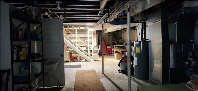 180 Pleasantview Dr, Ohioville, PA 15059 - unfinished basement featuring electric water heater and stairs
