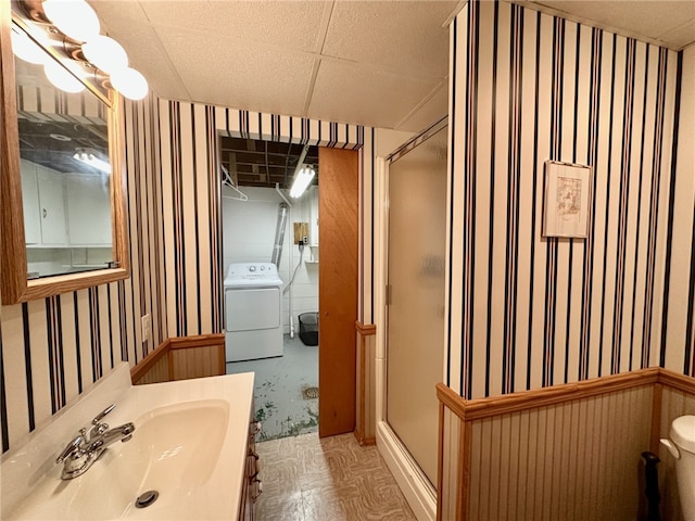 240 Reed St, Lower Burrell, PA 15068 - full bathroom featuring washer / clothes dryer, a shower stall, vanity, and wallpapered walls