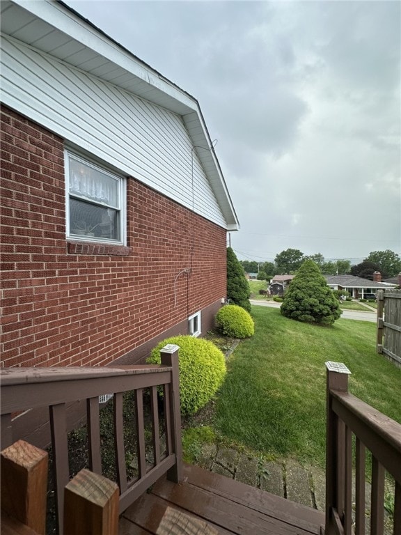 240 Reed St, Lower Burrell, PA 15068 - view of side of home featuring brick siding and a lawn