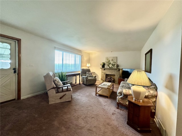 240 Reed St, Lower Burrell, PA 15068 - carpeted living area with a fireplace and baseboards